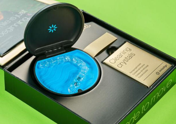 A box of Invisalign Cleaning Crystals